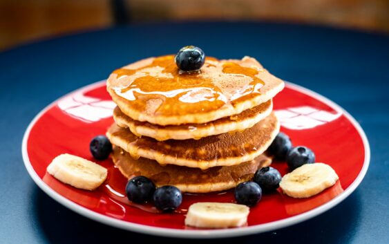baked pancake with blueberry and slice of banan